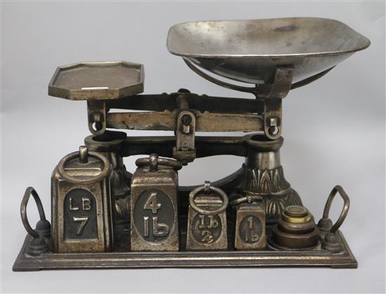 A set of scales and a pestle and mortar